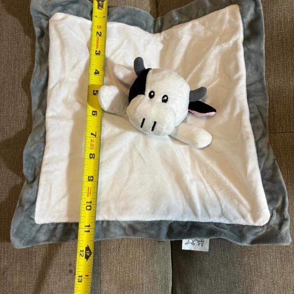 Baberoo white and gray cow plush lovey with black spots